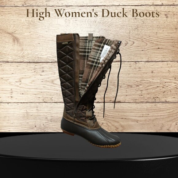 A pair of brown lace-up DUCK BOOTS with a round toe and low heel height - Picture 1 of 2